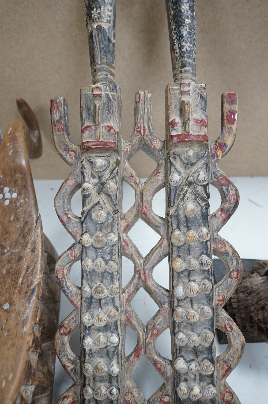 A Zulu painted wood fighting stick, a Nigerian twin group and a headrest (3)
